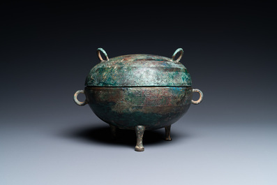 A Chinese bronze ritual tripod 'dui' food vessel and cover, Eastern Zhou