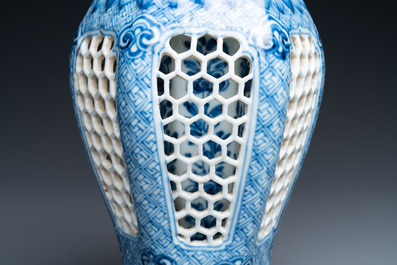 A Chinese reticulated double-walled blue and white vase, Kangxi