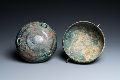 A Chinese bronze ritual tripod 'dui' food vessel and cover, Eastern Zhou