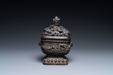 A Chinese bronze 'mythical beasts' censer and cover, 17th C.
