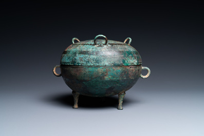 A Chinese bronze ritual tripod 'dui' food vessel and cover, Eastern Zhou