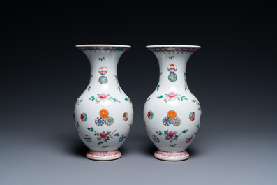 A pair of Chinese famille rose vases, Yongzheng mark, 19/20th C.