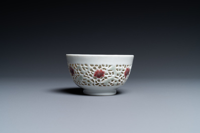 A Chinese reticulated double-walled cup with copper-red and celadon spots, Yongzheng