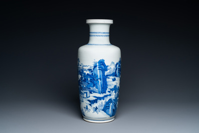 A Chinese blue and white rouleau vase with figures in a mountainous landscape, Kangxi