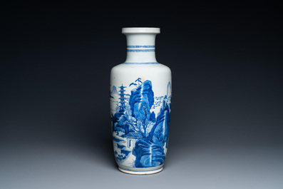 A Chinese blue and white rouleau vase with figures in a mountainous landscape, Kangxi