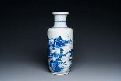 A Chinese blue and white rouleau vase with figures in a mountainous landscape, Kangxi