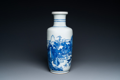 A Chinese blue and white rouleau vase with figures in a mountainous landscape, Kangxi
