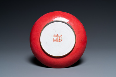 A Chinese 'ruby back' Canton enamel 'musicians' plate, Yongzheng