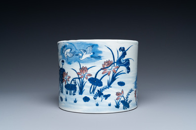 A large Chinese blue, white and copper-red brush pot, 19th C.