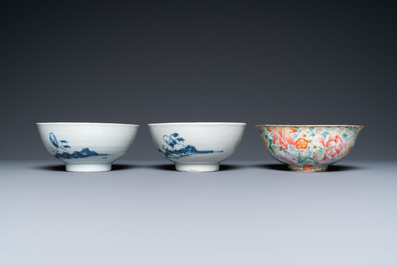 A pair of Chinese blue and white 'Nanking Cargo' bowls and a famille rose millefleurs bowl, 18/19th C.