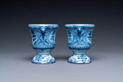 A pair of small Dutch Delft blue and white jardini&egrave;res, 18th C.