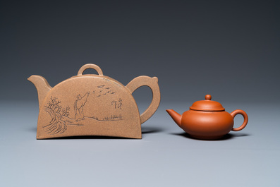 Two Chinese Yixing stoneware teapots with engraved inscriptions, 20th C.