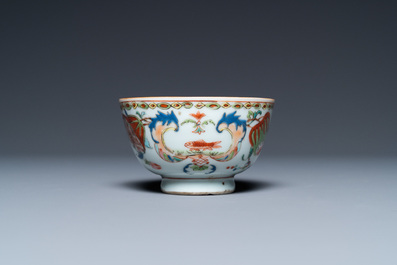A Chinese famille rose 'Pompadour' cup and saucer, Yongzheng/Qianlong