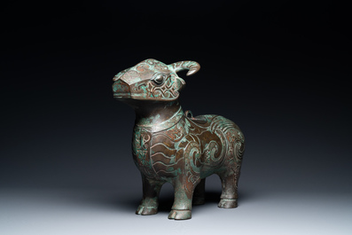 A Chinese ram-shaped silver-inlaid bronze 'xizun' vessel, Ming