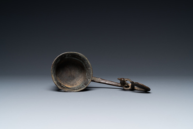 A Vietnamese bronze ladle depicting a musician, Dong Son, ca. 5th/2nd C. BC