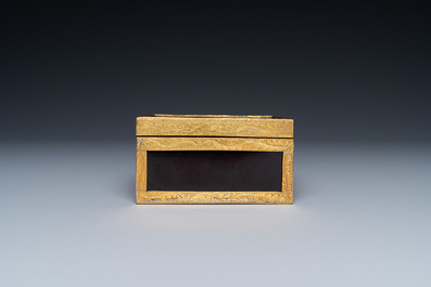 A Chinese gilt-copper box set with glass plaques, Beijing Imperial workshops, Qianlong