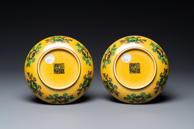 A pair of Chinese yellow-ground turquoise- and aubergine-glazed 'dragon and phoenix' plates, Qianlong mark, 19/20th C.