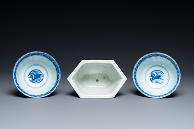 A Chinese hexagonal blue and white flower pot and two cups, Transitional period and later