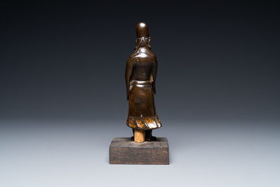 A Chinese partly gilt bronze figure of a scholar, Ming