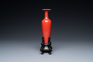 A Chinese slender 'peach bloom'-glazed vase, Kangxi mark but probably later