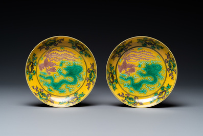 A pair of Chinese yellow-ground turquoise- and aubergine-glazed 'dragon and phoenix' plates, Qianlong mark, 19/20th C.