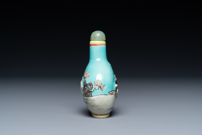 A Chinese relief-molded snuff bottle depicting goats, Yang He Tang mark, 19/20th C.