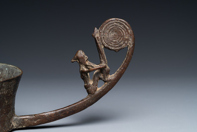 A Vietnamese bronze ladle depicting a musician, Dong Son, ca. 5th/2nd C. BC