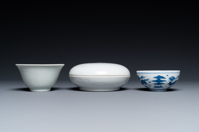 A Chinese white-glazed bowl, a small blue and white bowl and a covered box with incised design, Ming and Qing