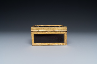A Chinese gilt-copper box set with glass plaques, Beijing Imperial workshops, Qianlong