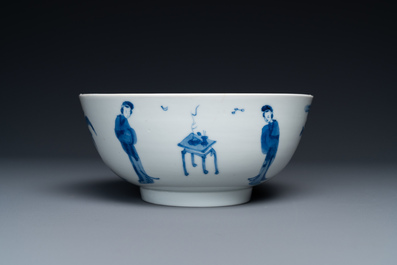A Chinese blue and white bowl and a pair of cups and saucers, Kangxi