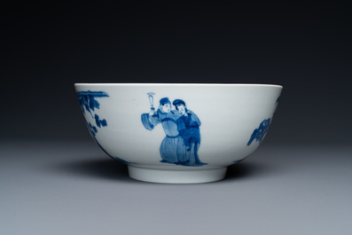A Chinese blue and white bowl and a pair of cups and saucers, Kangxi