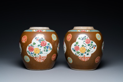 A pair of Chinese famille rose capucin brown-ground jars, Qianlong