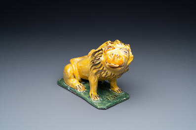 A polychrome Brussels faience model of a lion of Brabant, dated 1788