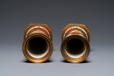 Une paire de vases en porcelaine de Chine famille rose aux montures en bronze dor&eacute;, Qianlong