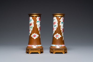 A pair of Chinese famille rose vases with gilt bronze mounts, Qianlong