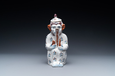 A rare Brussels faience monkey-shaped ewer and cover, 18th C.