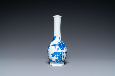 A Chinese blue and white bottle vase with a lady and her servant in a landscape, Transitional period
