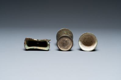 A Vietnamese bronze axe head, Dong Son, 3rd/1st C. BC and a small lime jar, L&ecirc; Dynasty, 15th C.