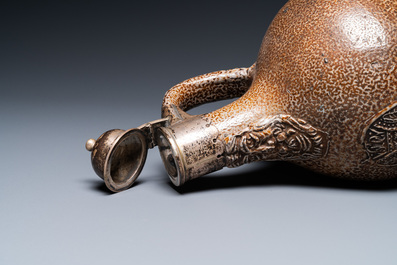 An English silver-mounted stoneware bellarmine jug, Frechen, 17th C.