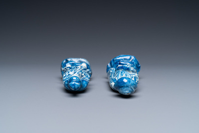 Two Dutch Delft blue and white figures of a Chinese man and woman, 1st quarter 18th C.