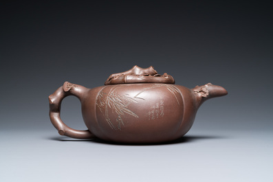 A Chinese melon-shaped Yixing stoneware teapot, signed Qi Tao (Wu Hanwen) and dated 1923