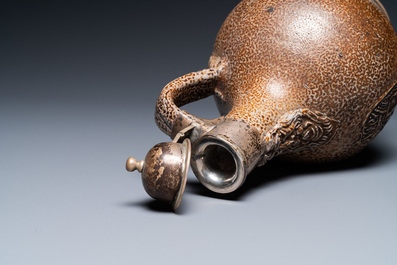 An English silver-mounted stoneware bellarmine jug, Frechen, 17th C.