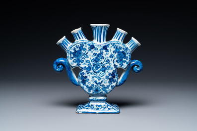 A Dutch Delft blue and white heart-shaped tulip vase with putti, 1st half 18th C.