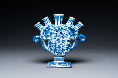 A Dutch Delft blue and white heart-shaped tulip vase with putti, 1st half 18th C.