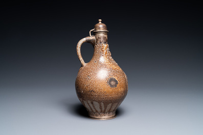 An English silver-mounted stoneware bellarmine jug, Frechen, 17th C.