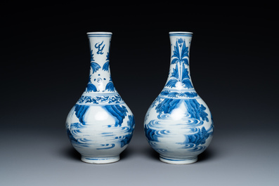 A pair of Chinese blue and white 'Wang Xizhi' bottle vases, Transitional period