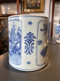 A Chinese blue and white brush pot with a landscape and antiquities, Kangxi