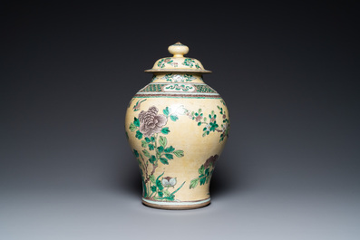 A Chinese yellow-ground verte biscuit vase and cover, 19th C.