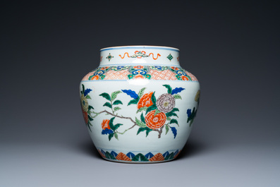 A Chinese wucai vase with floral design, 19th C.