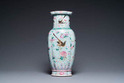 A Chinese famille rose turquoise-ground vase, 19th C.